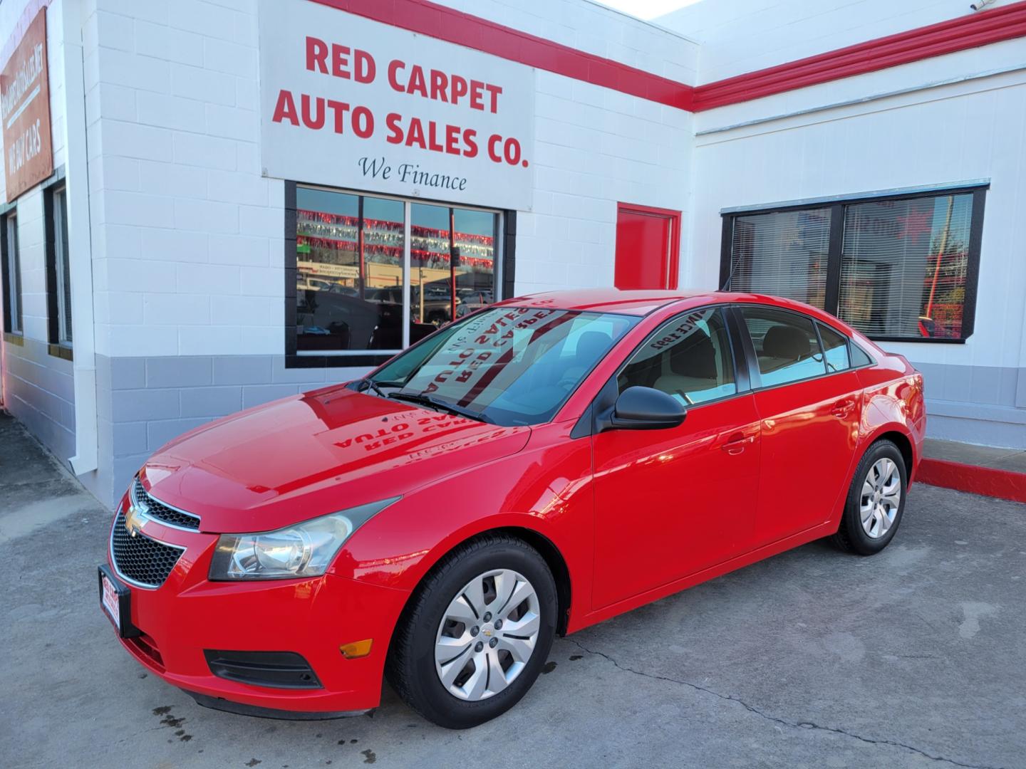 2014 Red Chevrolet Cruze LS Auto (1G1PA5SH8E7) with an 1.8L L4 DOHC 16V FFV engine, 6-Speed Automatic transmission, located at 503 West Court, Seguin, TX, 78155, (830) 379-3373, 29.568621, -97.969803 - Photo#0